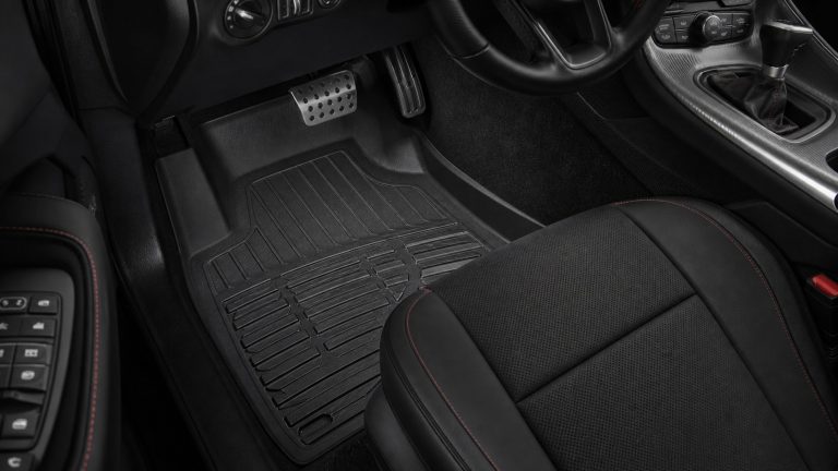 Challenger exact-fit floor liner coverage around pedals and console edges.