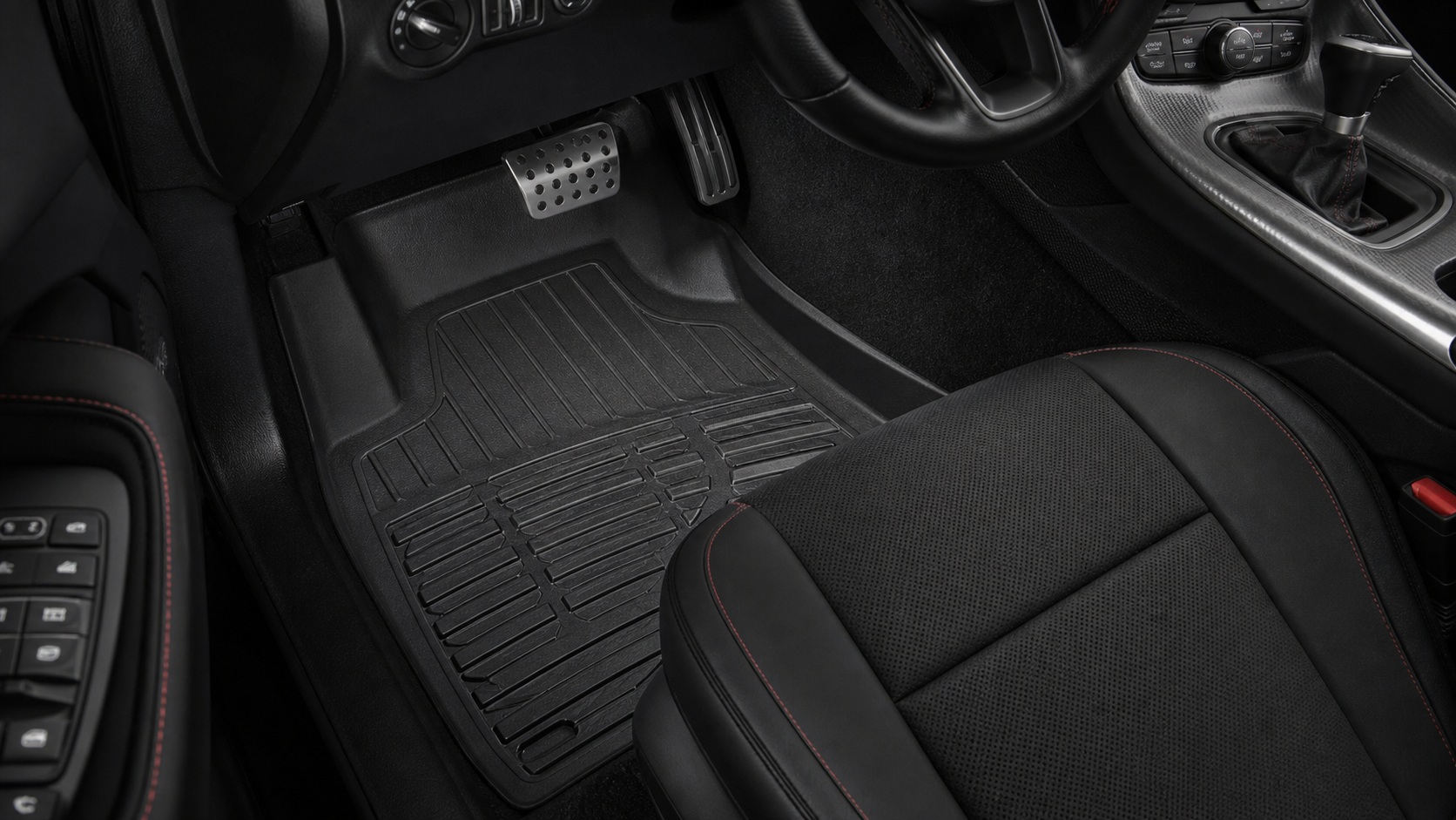 Challenger exact-fit floor liner coverage around pedals and console edges.