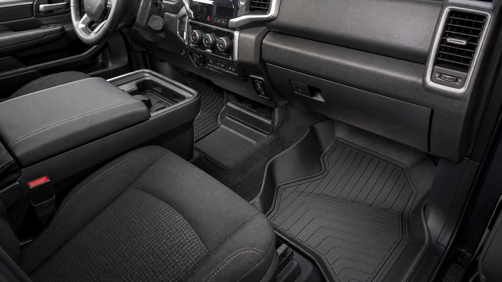 Ram 1500 front cabin with high-wall floor liners and practical footwell coverage.