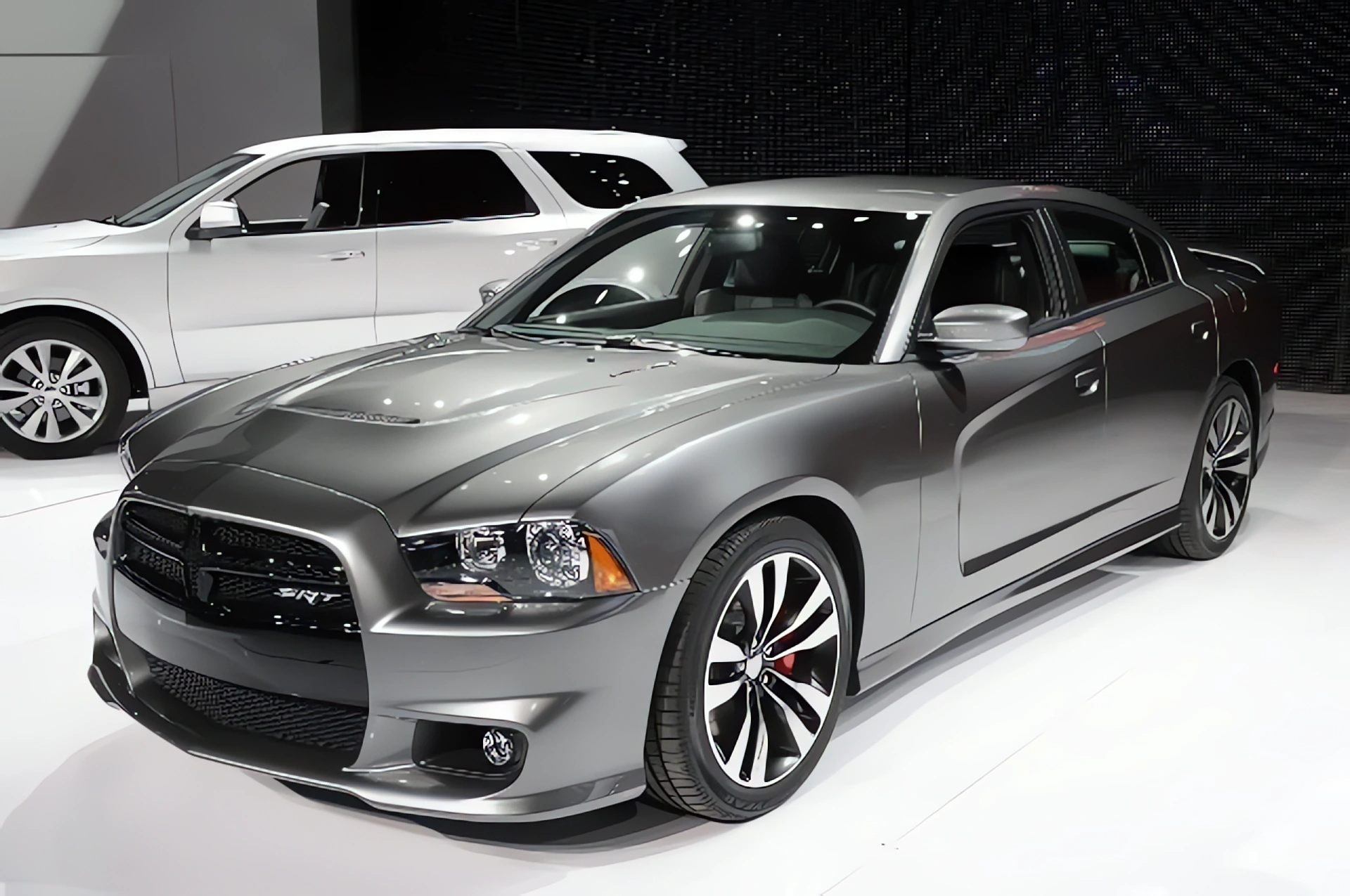 2012 Charger SRT8 Superbee RWD and 2012 Ford Taurus